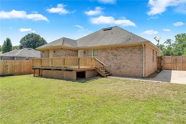 2107 Wolf Branch Dr N, Mobile, AL 36608 - back of property featuring brick siding, a wooden deck, and a shingled roof