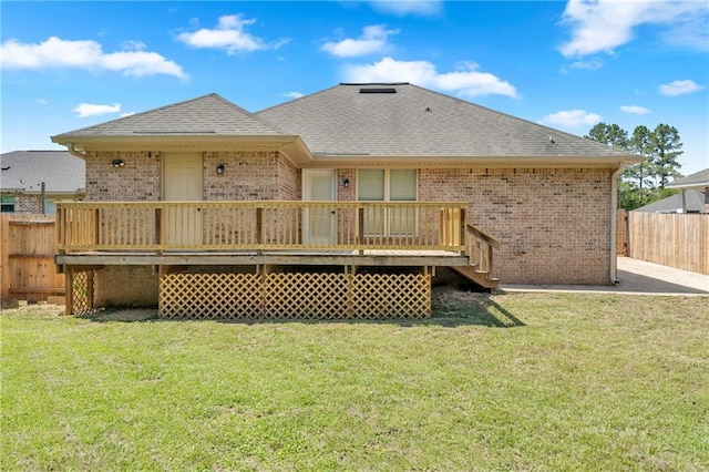 2107 Wolf Branch Dr N, Mobile, AL 36608 - rear view of house featuring brick siding, roof with shingles, and a deck