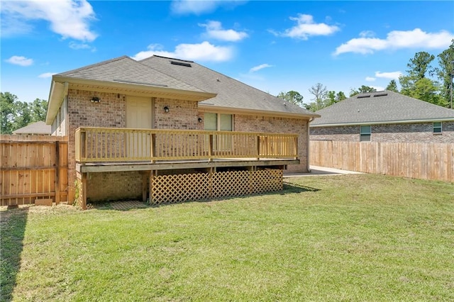 2107 Wolf Branch Dr N, Mobile, AL 36608 - rear view of property featuring brick siding, a wooden deck, and a shingled roof