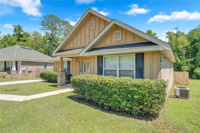 2107 Wolf Branch Dr N, Mobile, AL 36608 - view of front of property with board and batten siding and central air condition unit