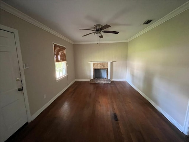 unfurnished living room featuring crown molding, ceiling fan, dark hardwood / wood-style flooring, and a fireplace