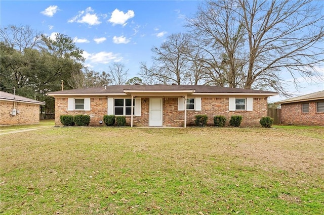 single story home featuring a front yard