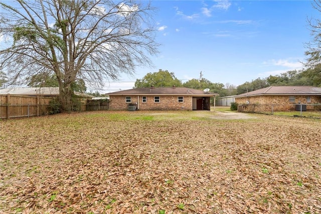 rear view of property featuring a patio