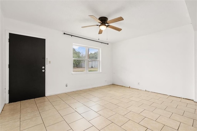 unfurnished room with ceiling fan