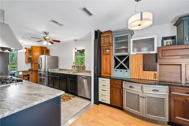 10407 Lala Rd, Daphne, AL 36526 - kitchen featuring visible vents, appliances with stainless steel finishes, wall chimney exhaust hood, and a ceiling fan