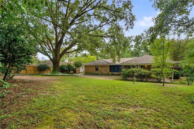 view of yard with fence