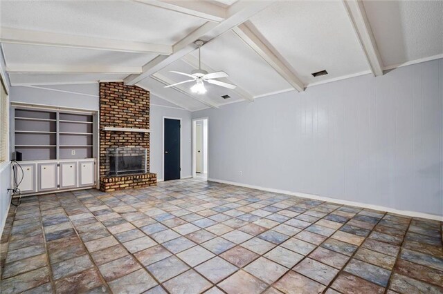 unfurnished living room with built in shelves, ceiling fan, lofted ceiling with beams, and a brick fireplace