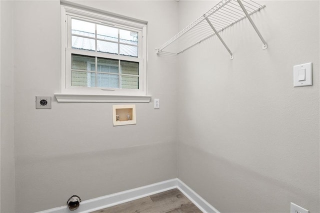 4625 Pine Blvd, Orange Beach, AL 36561 - laundry area featuring hookup for an electric dryer, hookup for a washing machine, baseboards, and wood finished floors