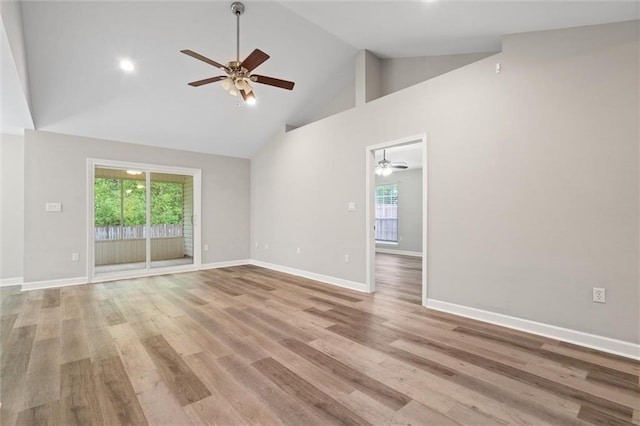 4625 Pine Blvd, Orange Beach, AL 36561 - unfurnished room featuring a ceiling fan, high vaulted ceiling, baseboards, and light wood-style floors