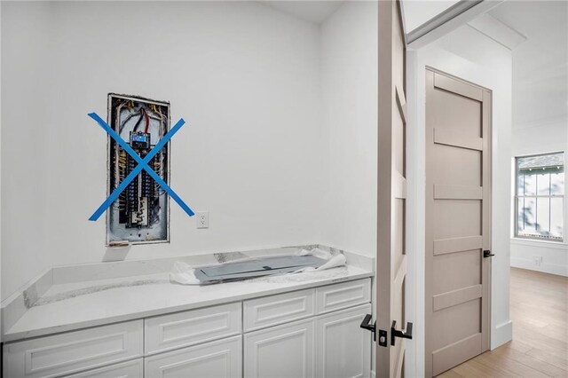 bathroom featuring vanity and wood-type flooring