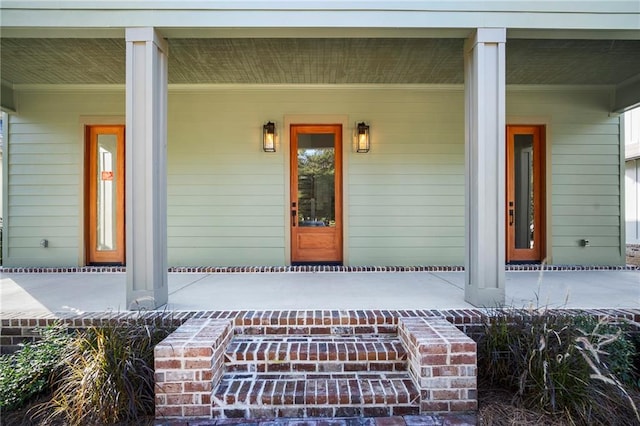 entrance to property with covered porch