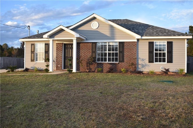 view of front of home with a front lawn