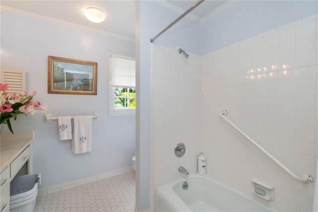 full bathroom featuring tile patterned flooring, shower / bath combination, toilet, ornamental molding, and baseboards