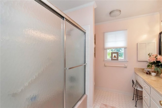 full bathroom featuring crown molding, tile patterned floors, combined bath / shower with glass door, vanity, and baseboards