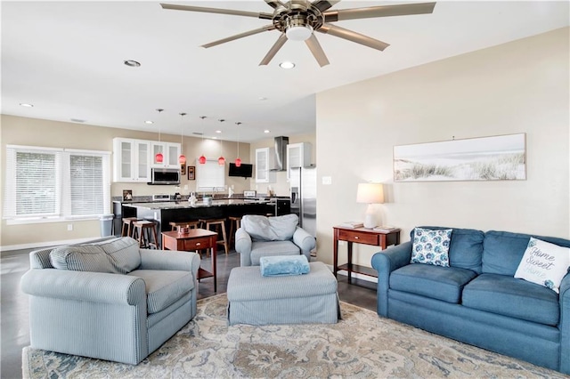 living room featuring ceiling fan