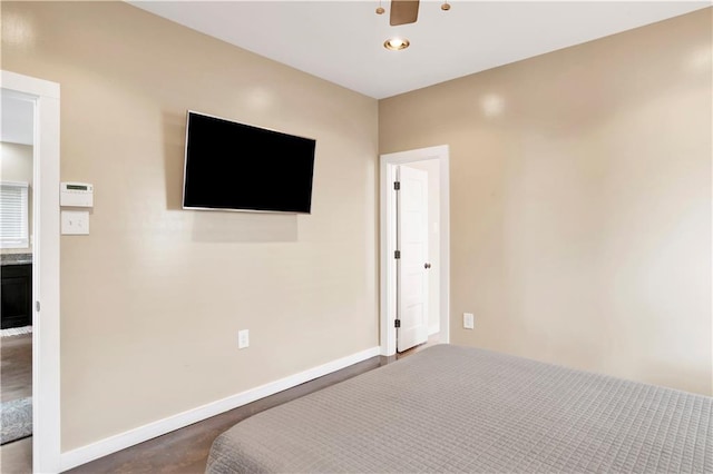 bedroom featuring dark colored carpet