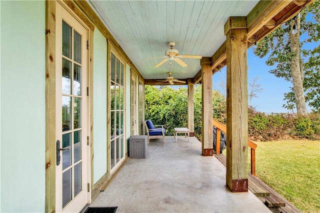 view of patio featuring ceiling fan