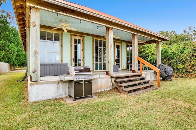 back of house featuring a yard