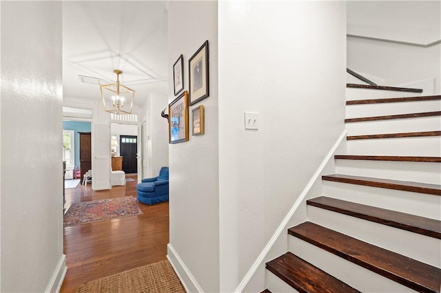 159 Roberts St, Mobile, AL 36604 - staircase with wood finished floors and a chandelier