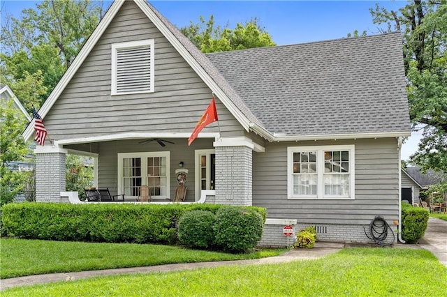159 Roberts St, Mobile, AL 36604 - view of front facade with a ceiling fan, a front yard, a shingled roof, and crawl space