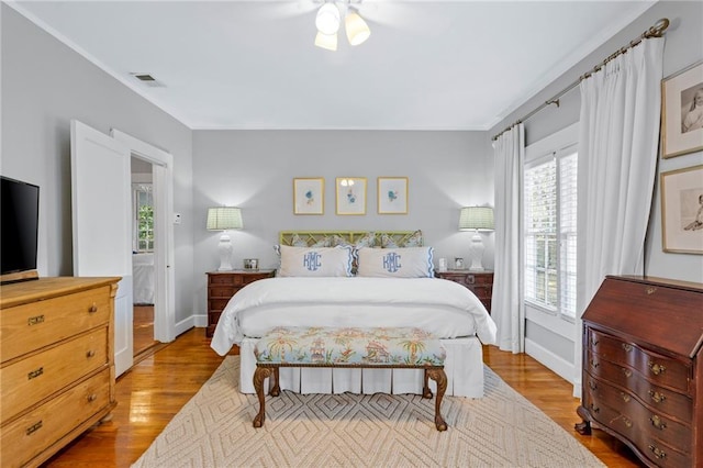 159 Roberts St, Mobile, AL 36604 - bedroom with wood finished floors and crown molding