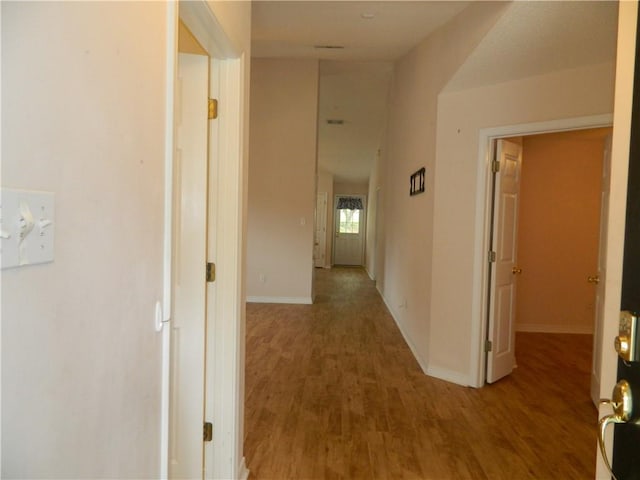 hallway featuring hardwood / wood-style floors