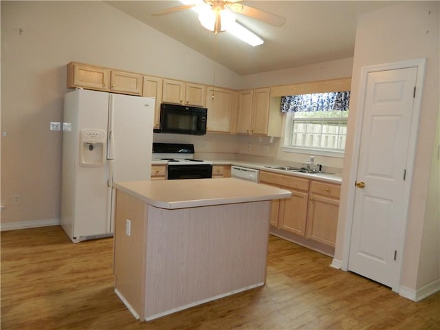 kitchen with light brown cabinetry, lofted ceiling, ceiling fan, and white appliances