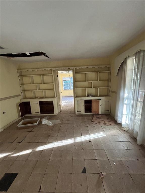 unfurnished living room with a fireplace