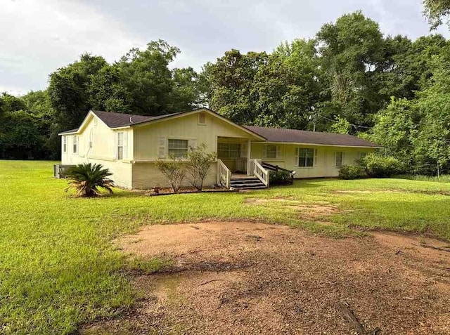 15162 Randolph Foster Rd, Wilmer, AL 36587 - ranch-style house with a front yard