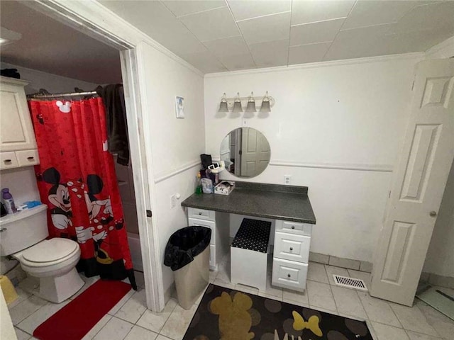 15162 Randolph Foster Rd, Wilmer, AL 36587 - full bathroom featuring crown molding, vanity, tile patterned floors, and shower / bath combo with shower curtain
