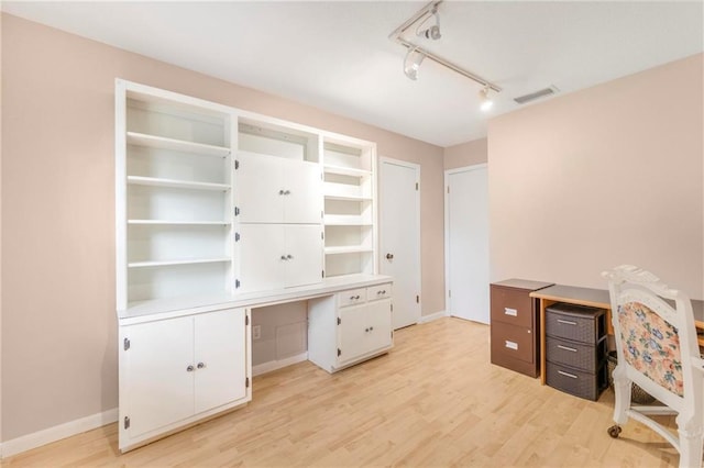 5721 Long Meadow Rd, Mobile, AL 36609 - unfurnished office with light wood-style floors, baseboards, and track lighting