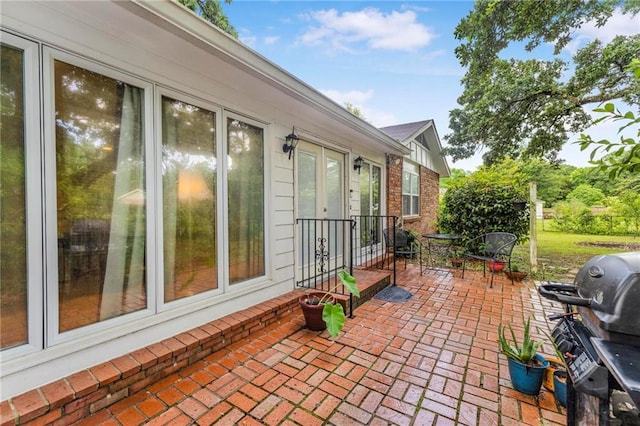 5721 Long Meadow Rd, Mobile, AL 36609 - view of patio / terrace with a grill and french doors