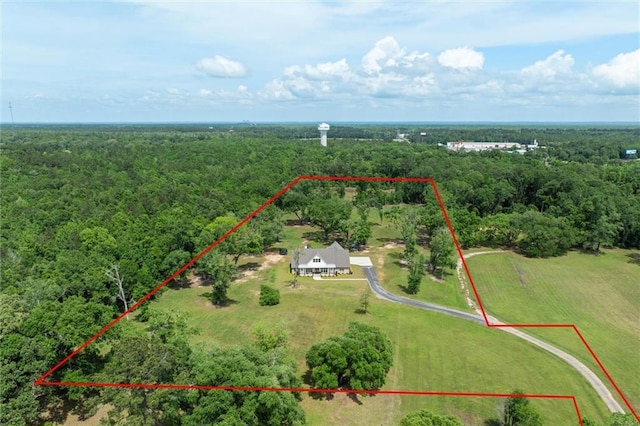 aerial view with a rural view and a view of trees