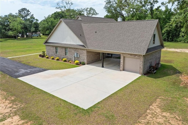 craftsman-style house with a front yard, a shingled roof, brick siding, and driveway