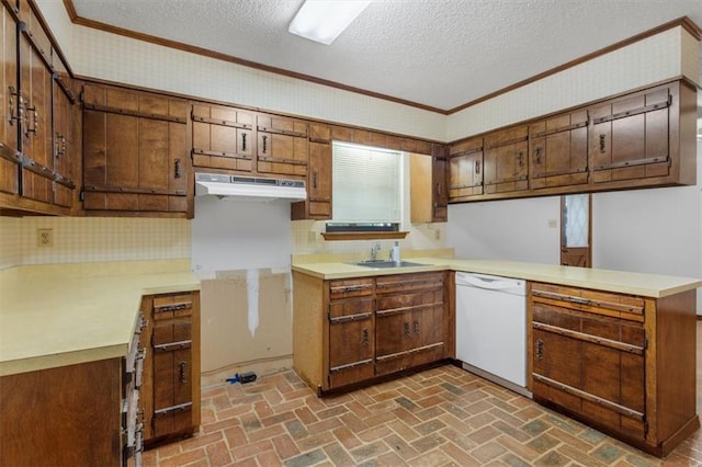 kitchen with a textured ceiling, tasteful backsplash, kitchen peninsula, crown molding, and white dishwasher