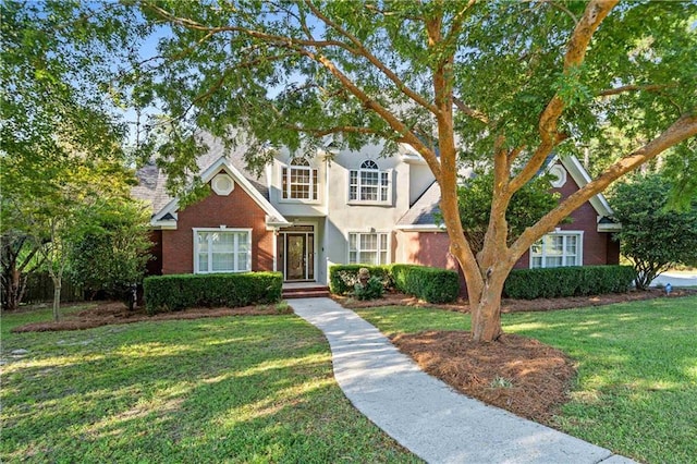 view of front facade with a front yard