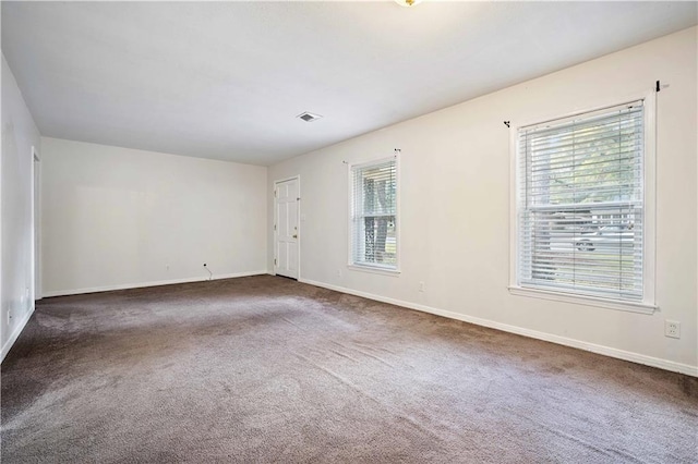 view of carpeted spare room