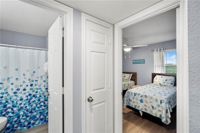 400 Plantation Rd Unit 4206, Gulf Shores, AL 36542 - bedroom with wood finished floors and ceiling fan