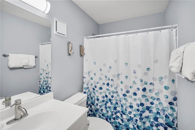 400 Plantation Rd Unit 4206, Gulf Shores, AL 36542 - full bathroom with toilet, vanity, and curtained shower