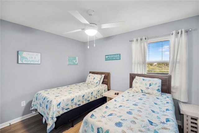 400 Plantation Rd Unit 4206, Gulf Shores, AL 36542 - bedroom with wood finished floors, baseboards, and ceiling fan
