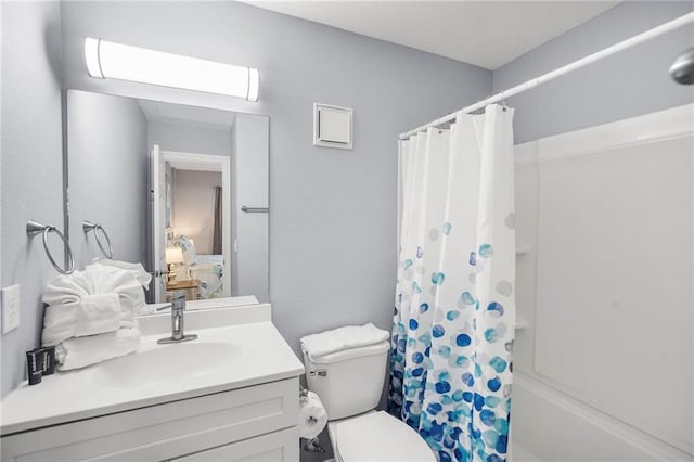 400 Plantation Rd Unit 4206, Gulf Shores, AL 36542 - full bath with shower / bath combination with curtain, vanity, and toilet