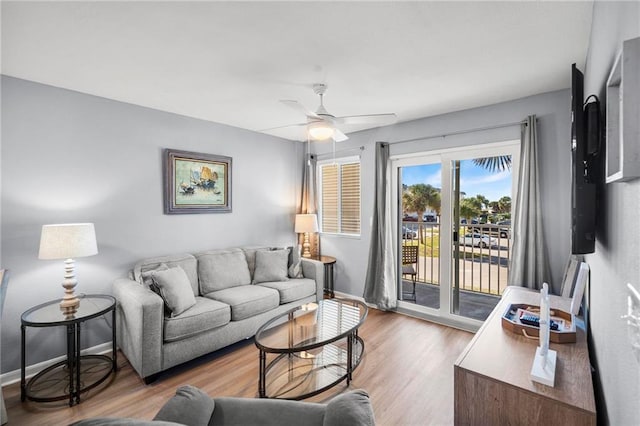 400 Plantation Rd Unit 4206, Gulf Shores, AL 36542 - living area with light wood-style flooring, ceiling fan, and baseboards