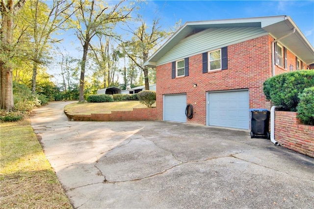 view of home's exterior featuring a garage