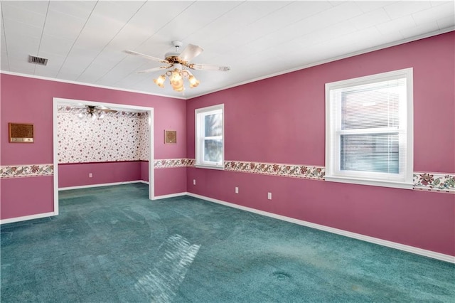 unfurnished room featuring ceiling fan and dark carpet