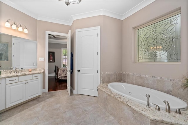 bathroom featuring vanity, tiled bath, and crown molding