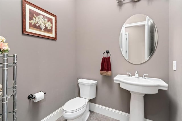 bathroom featuring toilet