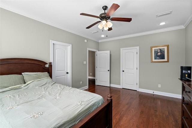 bedroom with ceiling fan, dark hardwood / wood-style floors, and crown molding