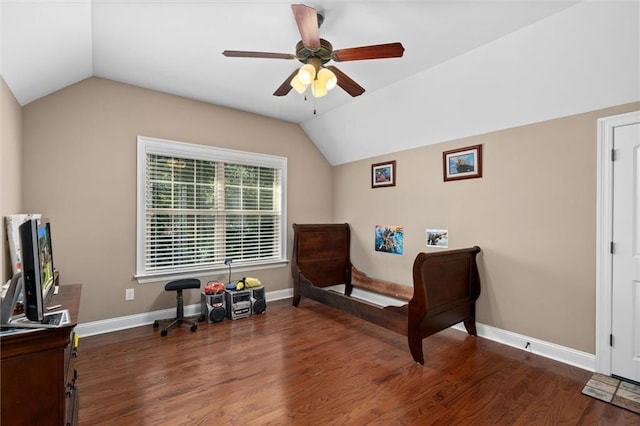 bedroom featuring ceiling fan, dark hardwood / wood-style floors, and vaulted ceiling