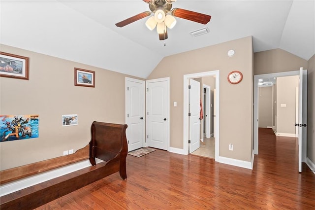 sitting room featuring ceiling fan, hardwood / wood-style floors, and vaulted ceiling