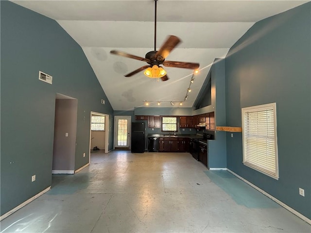 unfurnished living room featuring ceiling fan, sink, high vaulted ceiling, concrete flooring, and track lighting